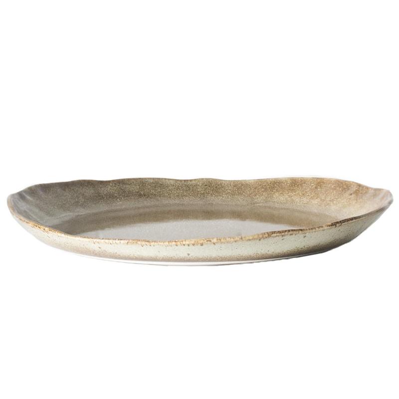 assiette i jordfärgad keramik – från sidan