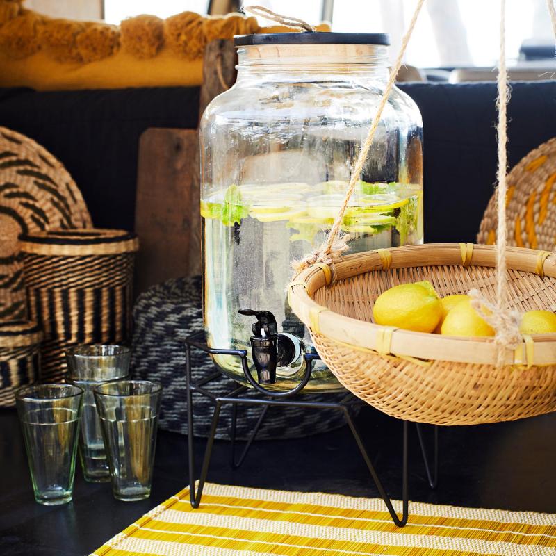 Behållare i glas med tappkran och ställning