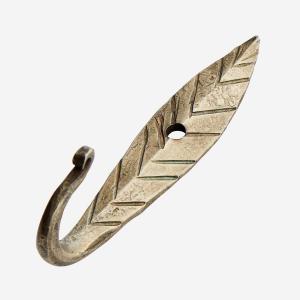 krok som en fjäder i guldfärg