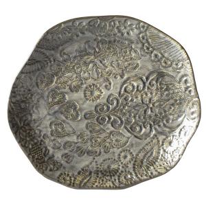 tallrik i ojämn keramik