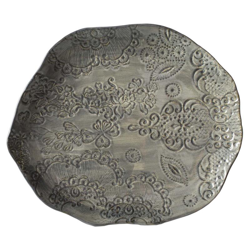 tallrik i ojämn keramik