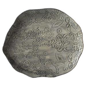 tallrik i ojämn keramik