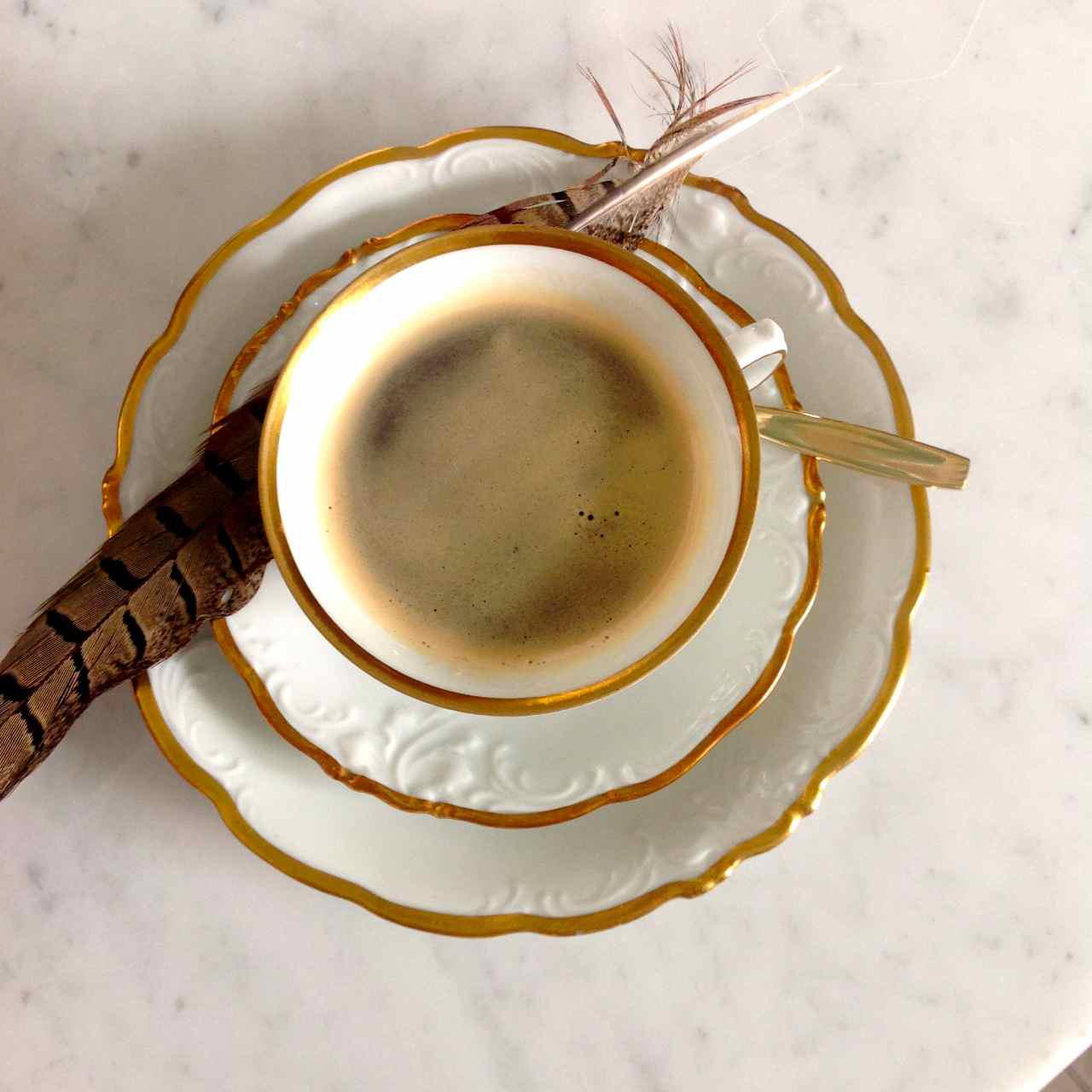 Kaffekopp och assiett med anor