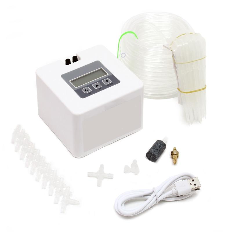 Automatiskt bevattningssystem programmerbart med timer för växter