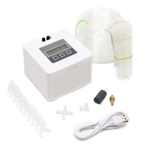 Automatiskt bevattningssystem programmerbart med timer för växter