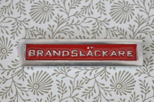 Skylt  BRANDSLÄCKARE röd