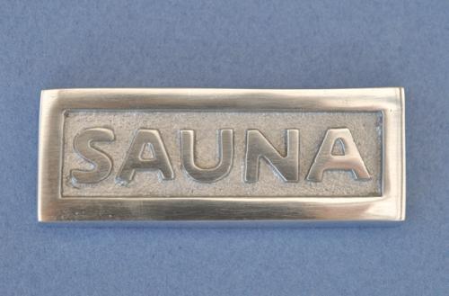 Skylt  SAUNA