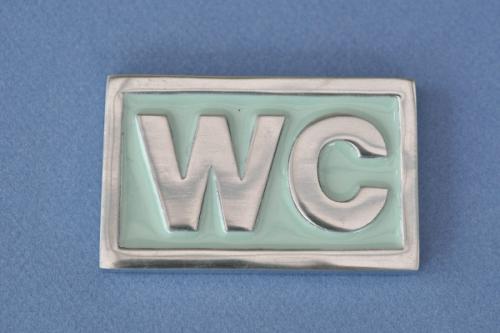 Skylt  WC  ljusblå