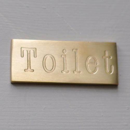 Toilet - skylt - mässing