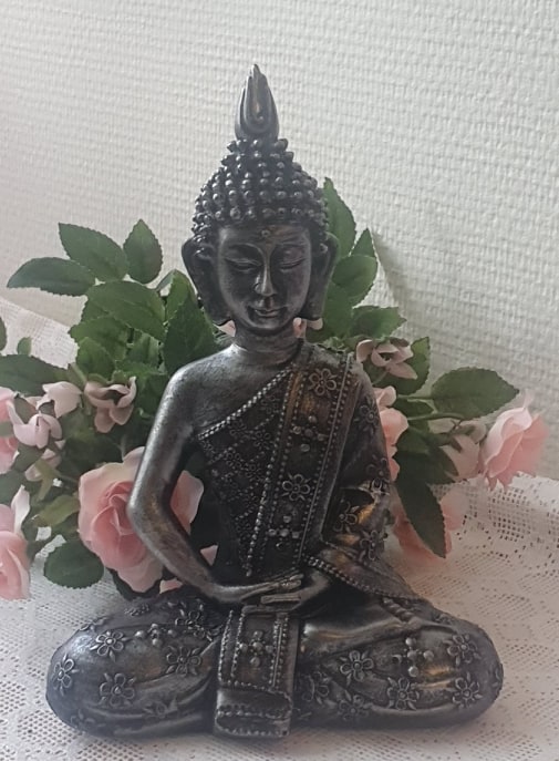 Buddha Sittande