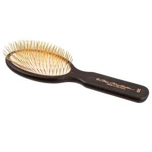 Chris Christensen Gold Series oval hundborste med 20 mm långa guldpläterade stålpiggar.