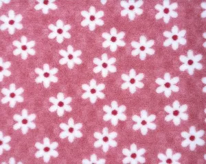 Vetbed Pebbles hundfäll, rosa med vita blommor. Med gummerad baksida.