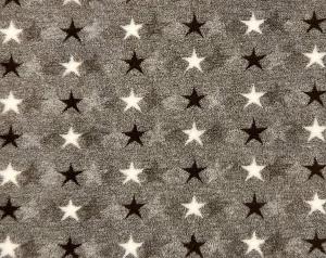 Vetbed hundfäll brunmelerad med vita och bruna stjärnor på rad. Gummerad baksida.