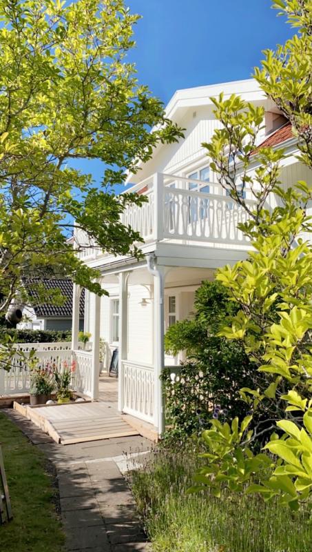 A house with baluster - Decorative wooden victorian sawn baluster & picket. Made in Sweden.