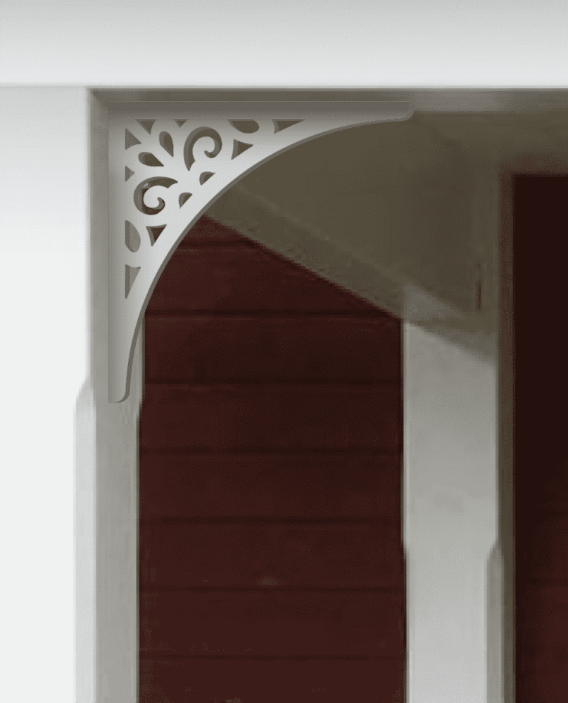 A white painted Victorian bracket 015 in a red porch decorated with from Gaveldekor from Sweden.