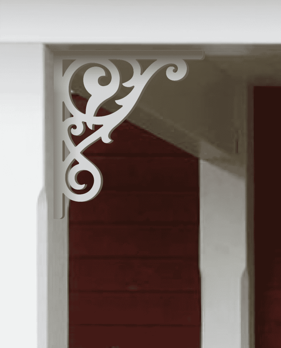 A white painted Victorian bracket 018 in a red porch decorated with from Gaveldekor from Sweden.
