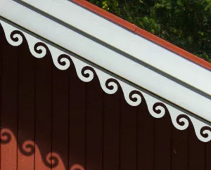 A red house with victorian decoration & running trim 001 for eaves & bargeboards from Swedish Gaveldekor