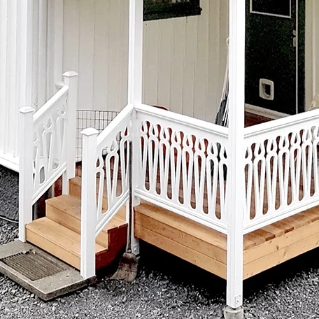 A white porch with baluster 014 from Swedish Gaveldekor