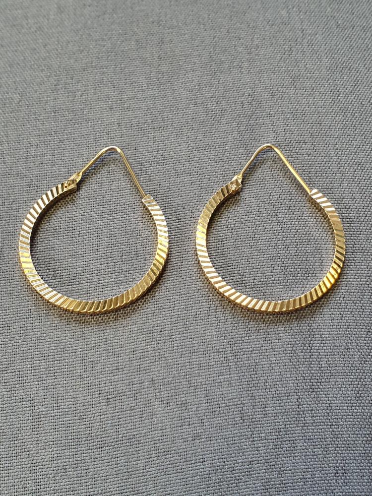 Creoler mönstrade 3,9gr 18K