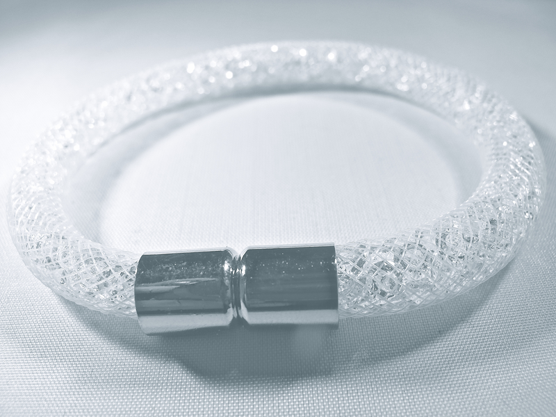White bracelet filled with white crystals