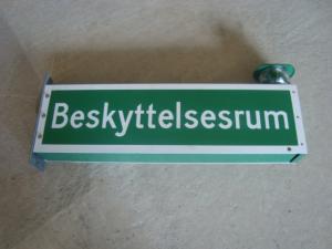 Syddsrums skylt med lampa 