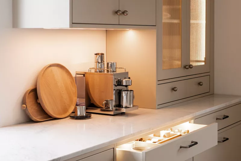 Custom-made aluminium LED strip above kitchen worktop
