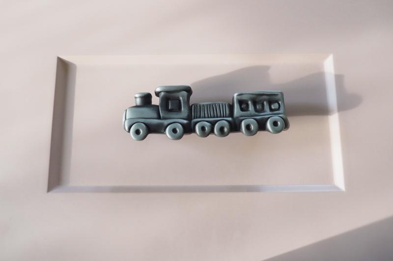 Antique train-shaped handle mounted on pink children