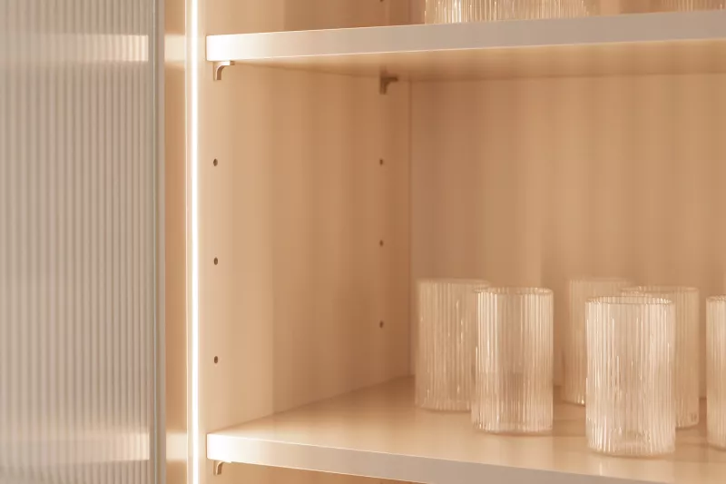 Custom-made silicone LED strip installed in wooden cabinet