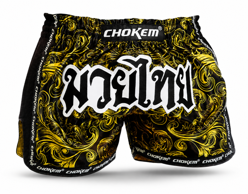 CHOKEM: NAK MUAY THAIBOXNINGSSHORTS - SVART/GUL