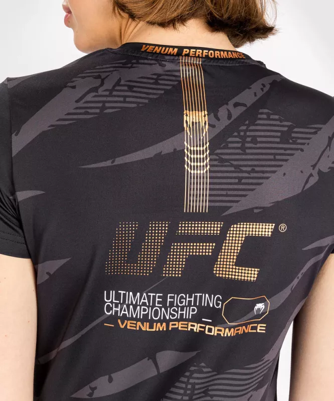 VENUM: UFC ADRENALINE FIGHT WEEK DRY-TECH T-SHIRT FÖR KVINNOR - URBAN CAMO