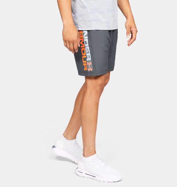 UNDER ARMOUR: WOVEN GRAPHIC WORDMARK SHORTS - STEALTH GRAY