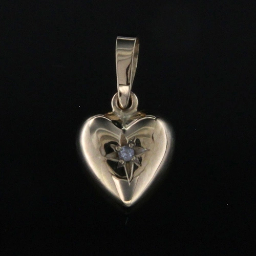 Hjärta 18k med cz i stjärnfattning