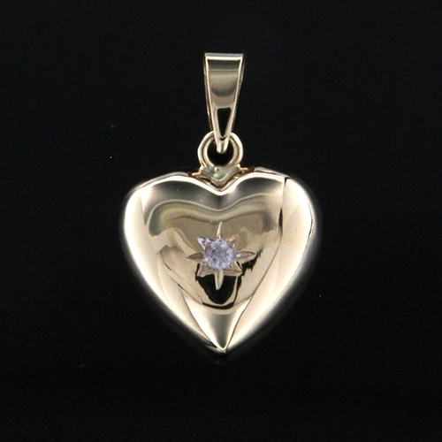 Hjärta 18k med cz i stjärnfattning