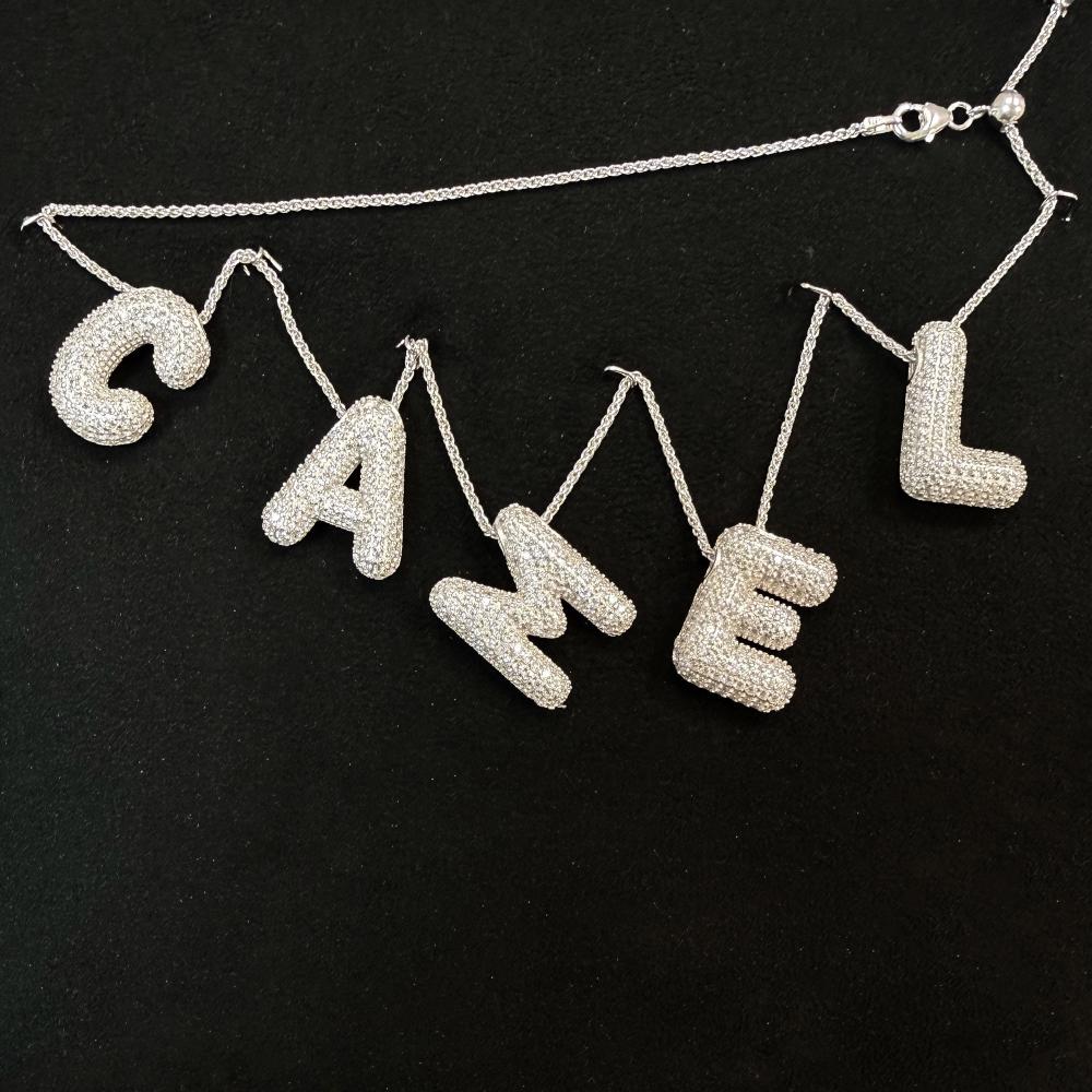 Hänge boktav rhod silver