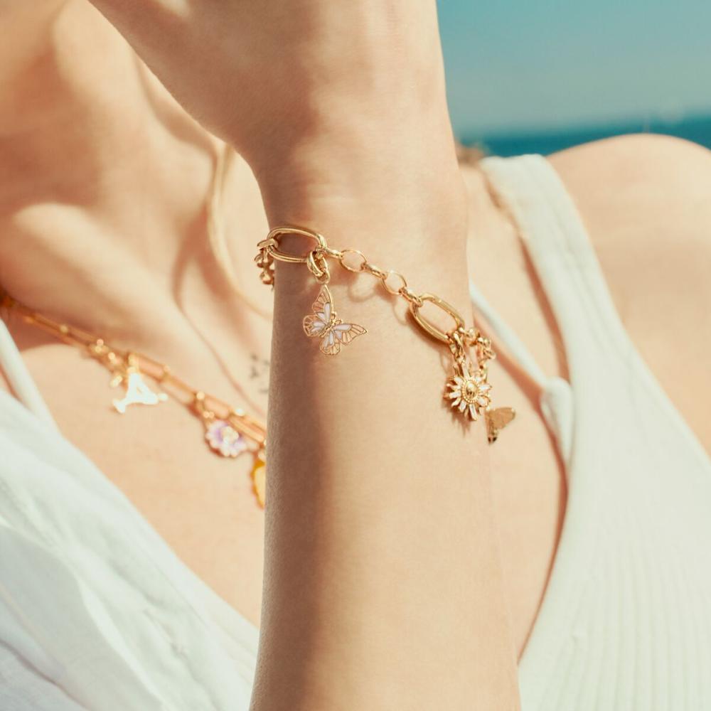 CHARM-HÄNGSMYCKE FJÄRIL CONNECT GULDPLÄTERAD