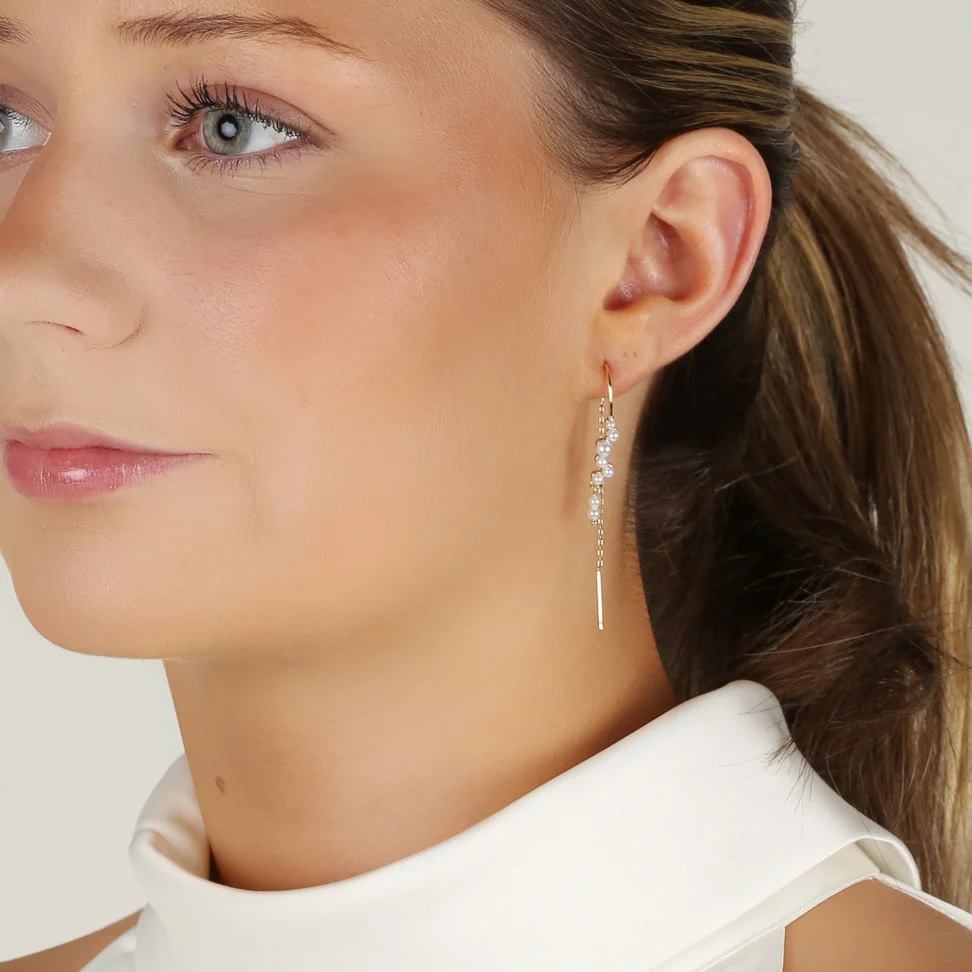 Line tassle ear g/white