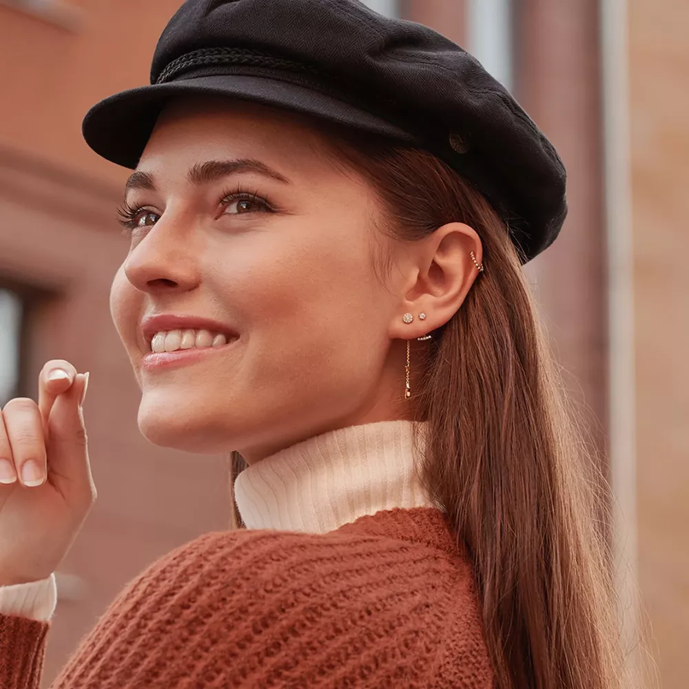 SINGLE EAR STUD WHITE STONES GOLD