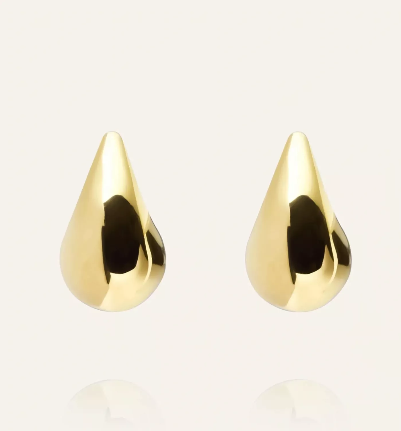 PLAIN daring large gold dupe earring