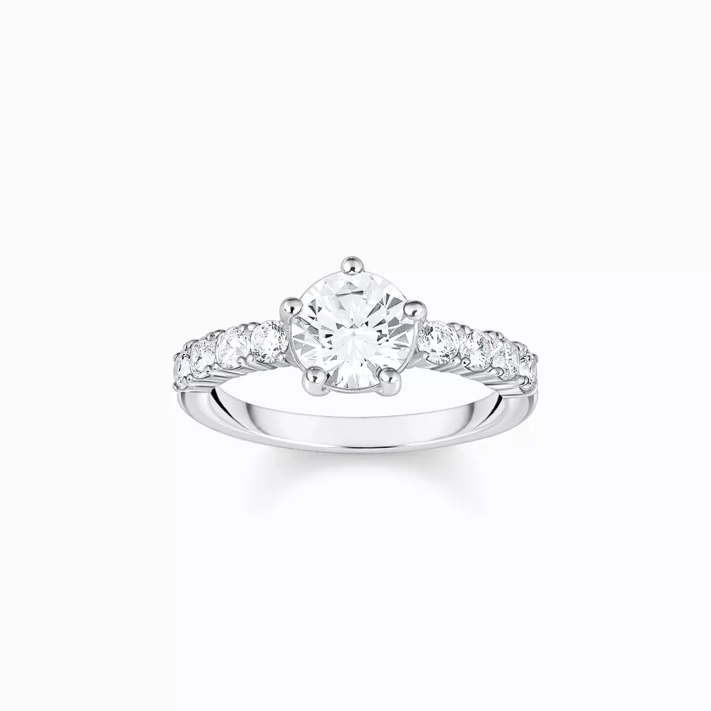 Solitärring med stor samt små stenar storlek 54