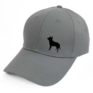 Keps med en Australian Cattledog