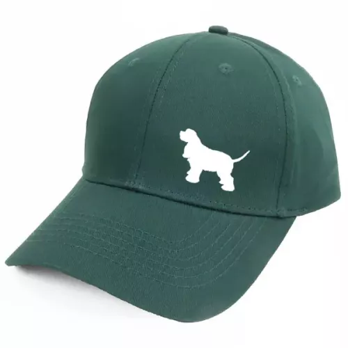 Keps med en Amerikansk Cocker Spaniel