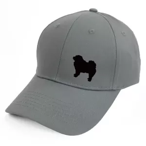 Keps med en Chow Chow