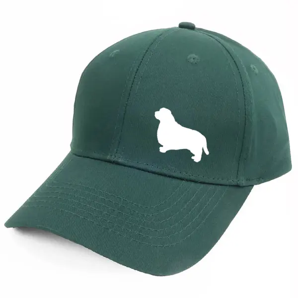 Keps med en Clumber Spaniel