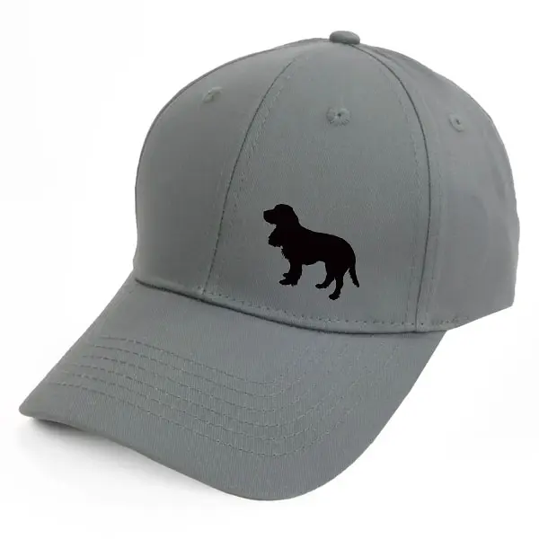 Keps med en Field Spaniel