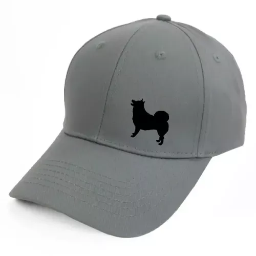 Keps med en Isländsk Fårhund