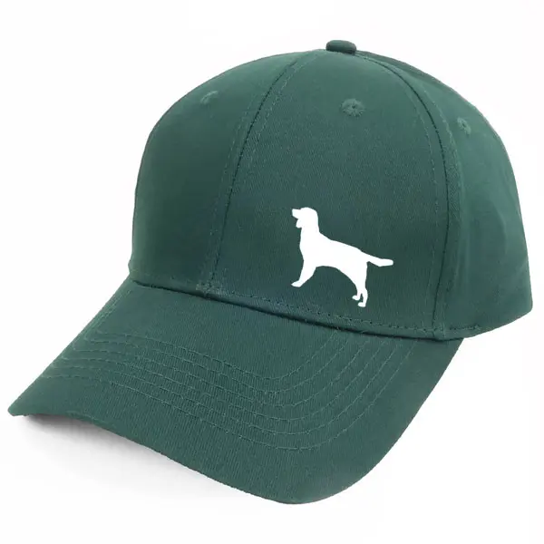 Keps med en Kleiner Münsterländer