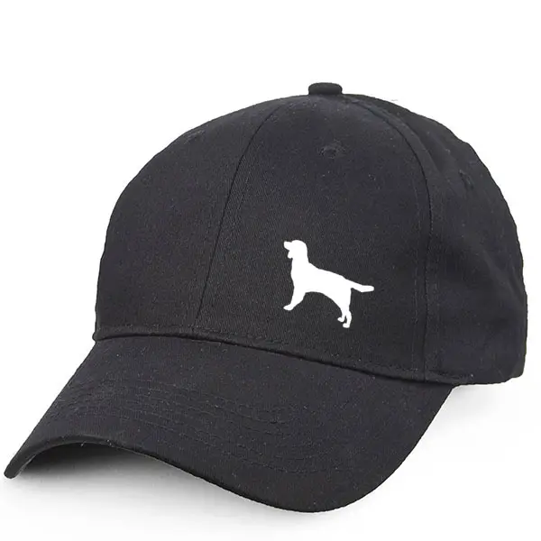 Keps med en Kleiner Münsterländer