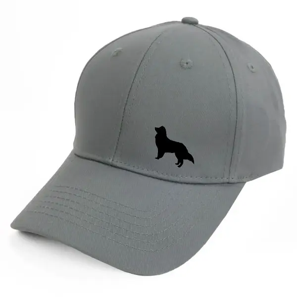 Keps med en Miniature American Shepherd