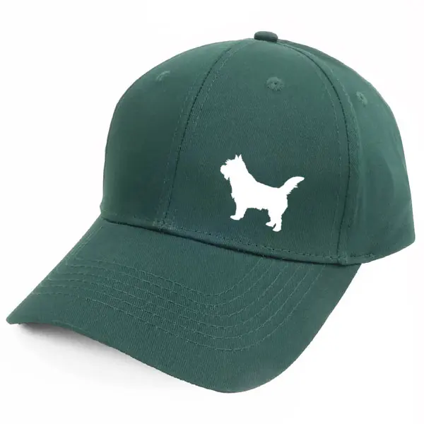 Keps med en Norwichterrier