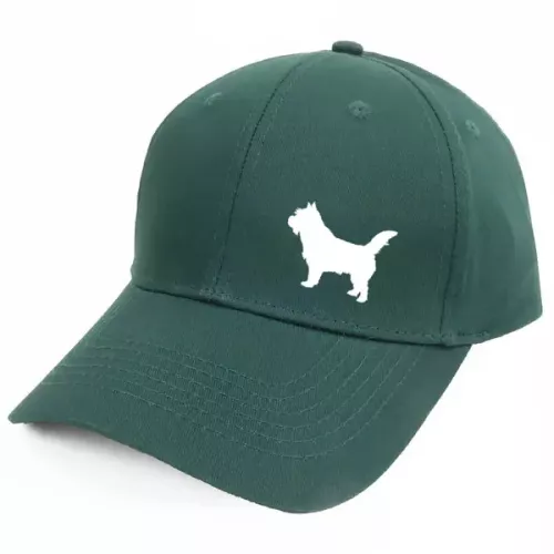 Keps med en Norwichterrier